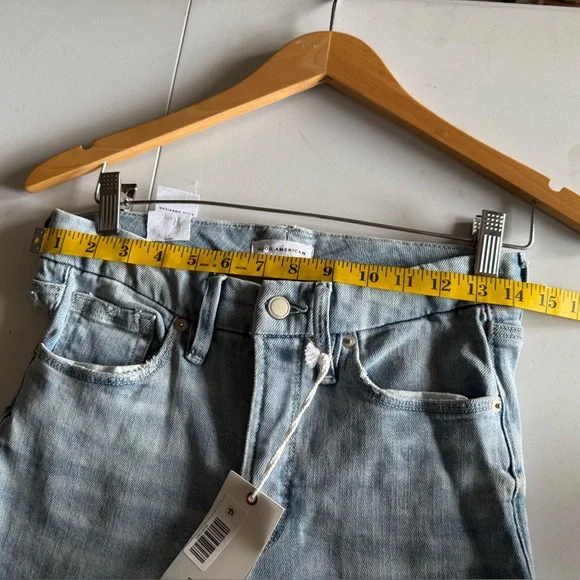 Good American high-rise skinny jeans with distressed knees and raw hem
Size 2/26 - Picture 9 of 11